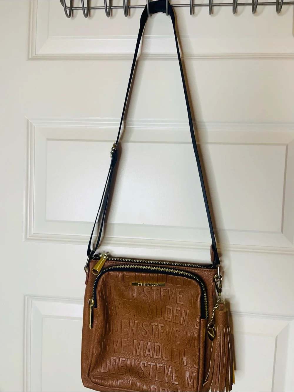 Steve Madden | BGLAMM Camel Logo  Embossed Crossbody with Tassel